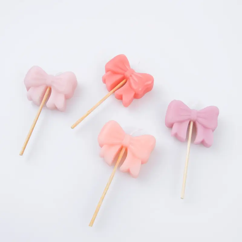Meri Meri – Candele Fiocco Rosa per Torta (x4)
